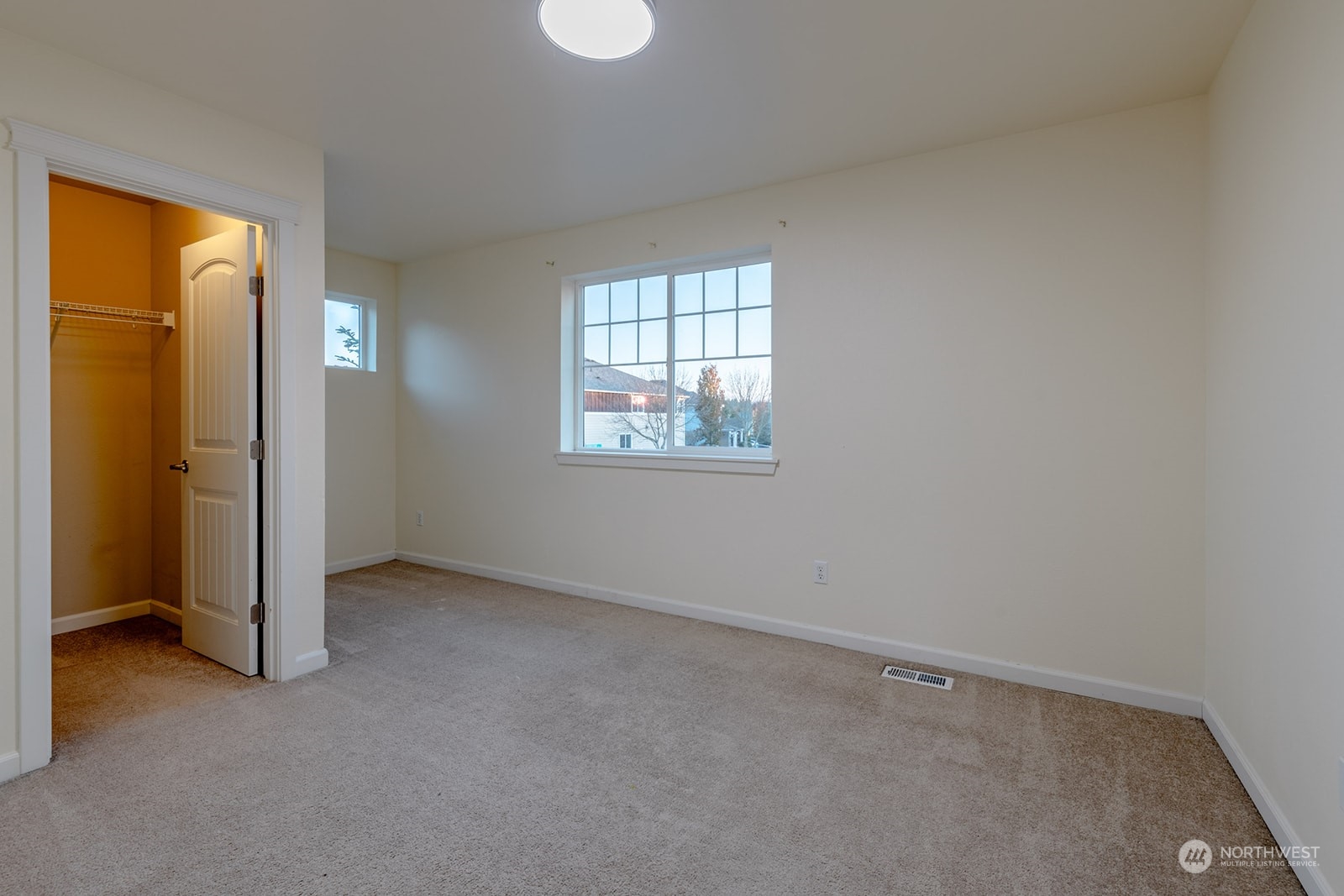 1324 Farina Loop Southeast Olympia, WA 98513 - Photo 19 of 40 an empty room with windows