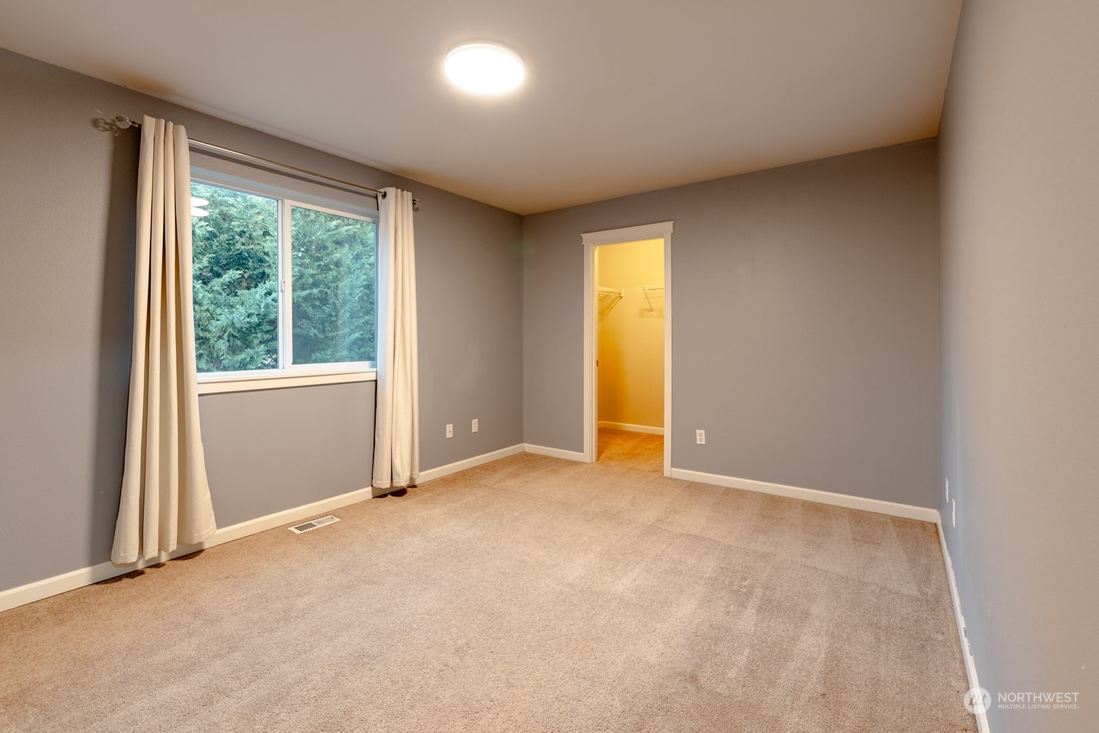 1324 Farina Loop Southeast Olympia, WA 98513 - Photo 24 of 40 an empty room with windows