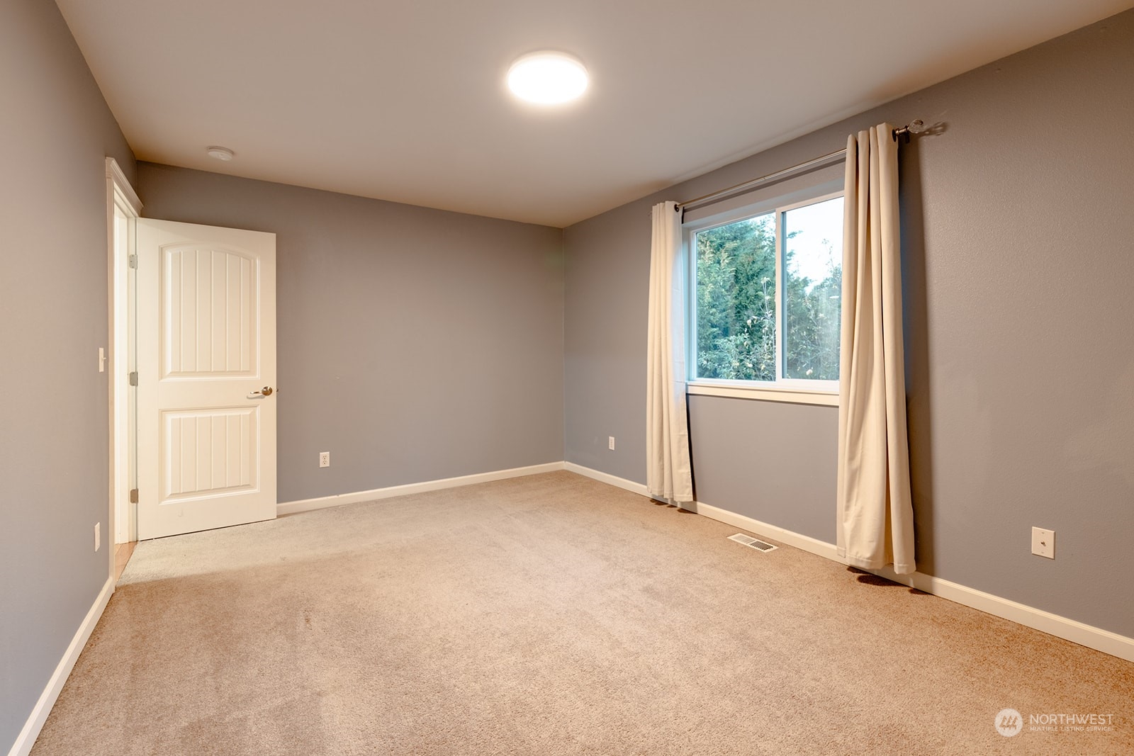 1324 Farina Loop Southeast Olympia, WA 98513 - Photo 25 of 40 an empty room with windows