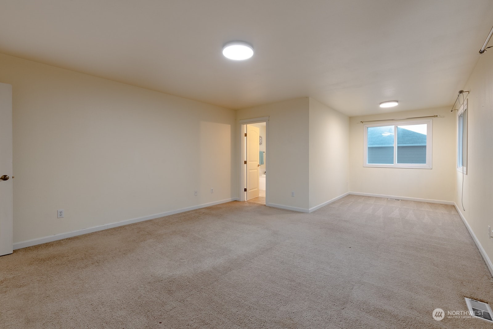 1324 Farina Loop Southeast Olympia, WA 98513 - Photo 27 of 40 a view of an empty room with a window