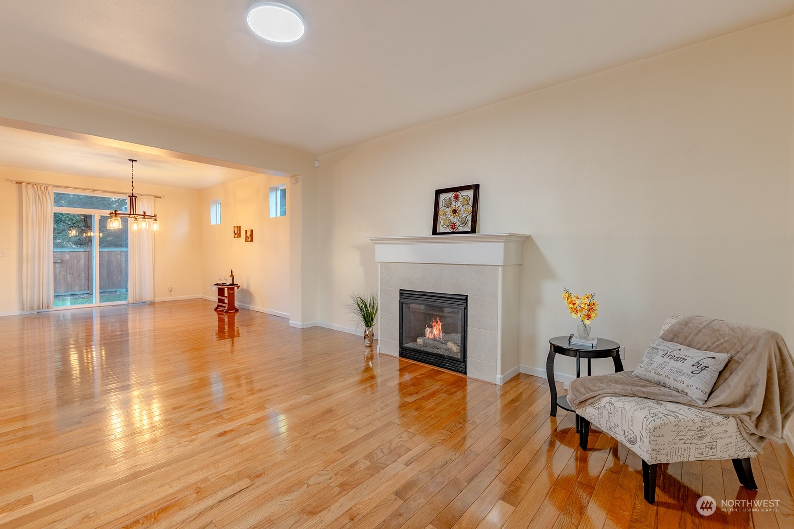1324 Farina Loop Southeast Olympia, WA 98513 - Photo 6 of 40 a living room with furniture and a fireplace