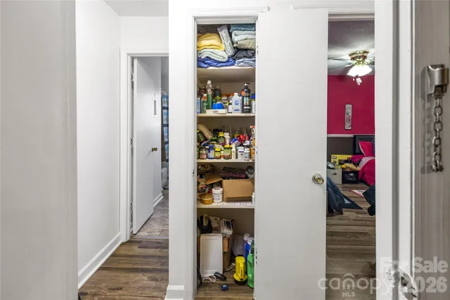 a view of kids room with walk in closet and bathroom