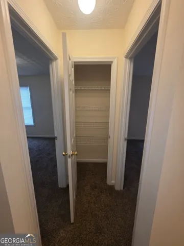 an empty room with a empty space and window