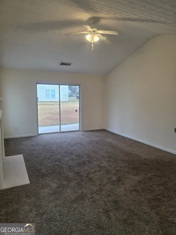 a view of empty room with window