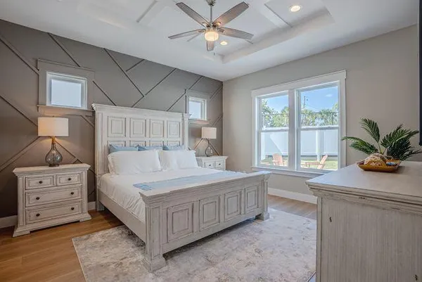 a bedroom with a bed and a dresser