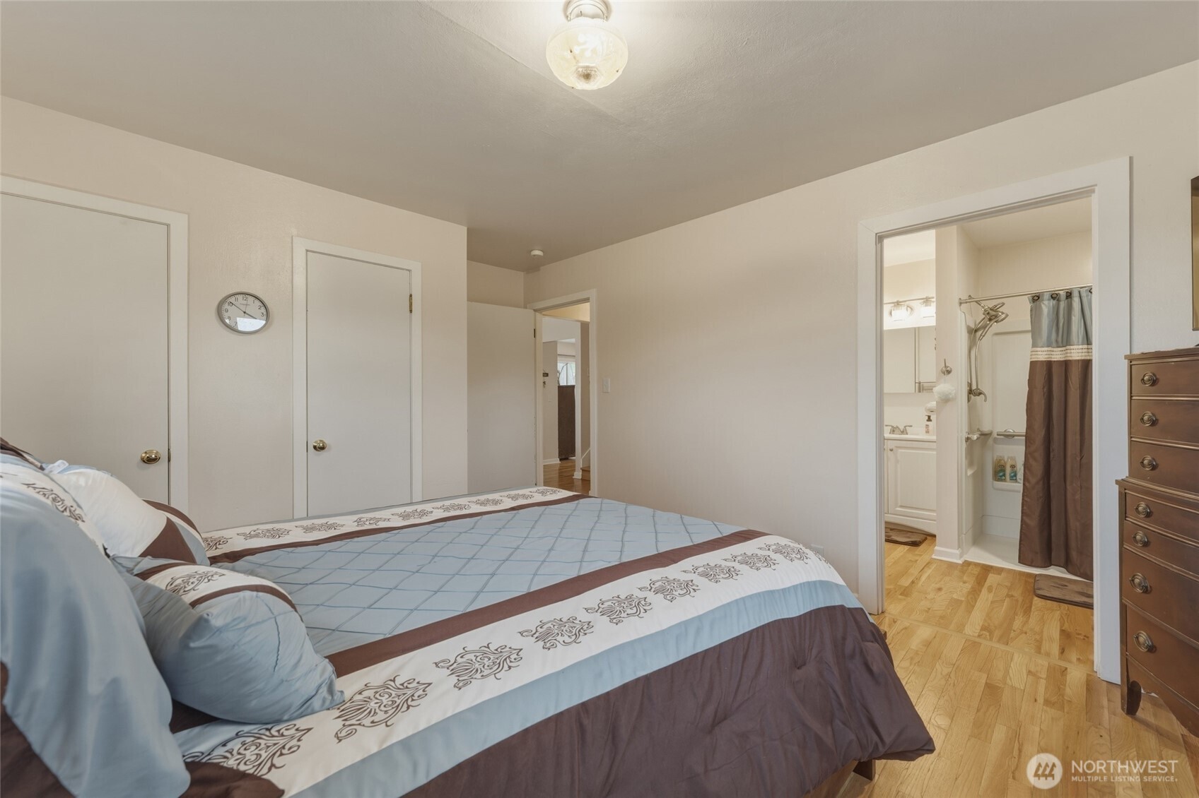 315 Thorn Hollow Road Dayton, WA 99328 - Photo 13 of 40 a bedroom with a bed and wooden floor