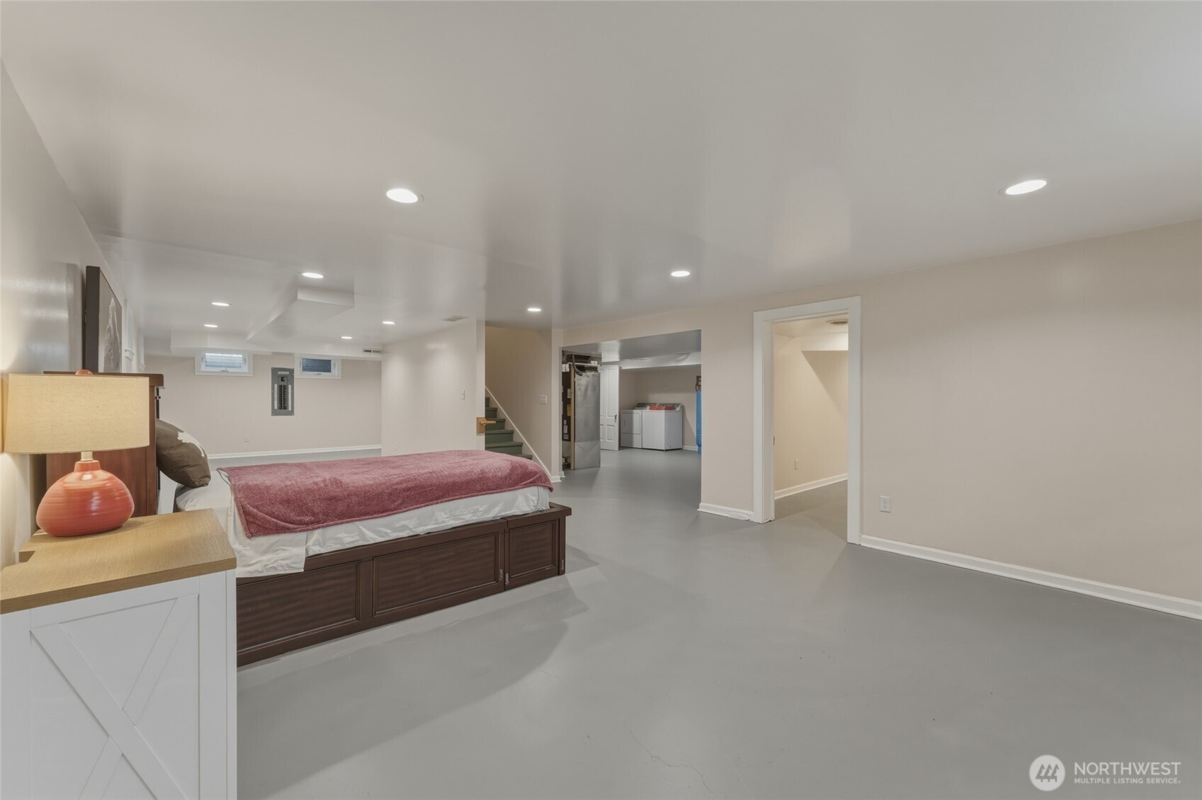 315 Thorn Hollow Road Dayton, WA 99328 - Photo 26 of 40 a spacious bedroom with a bed and a couch