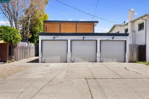 a front view of a house with a garage