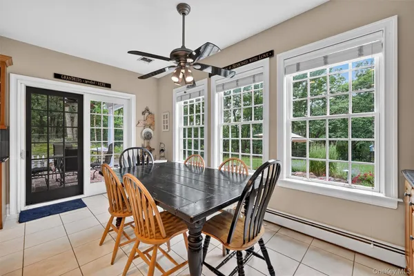 a dining room with furniture window wooden floor