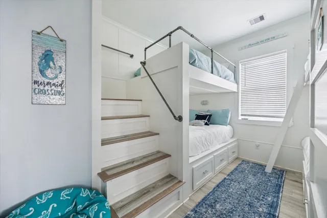 a room with a bed and a window