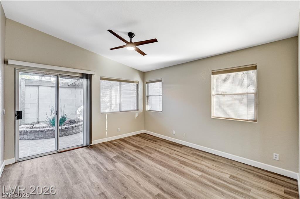 2283 Ramsgate Drive Henderson, NV 89074 - Photo 21 of 51 Sliding glass doors open directly to a private courtyard setting from this versatile living space.