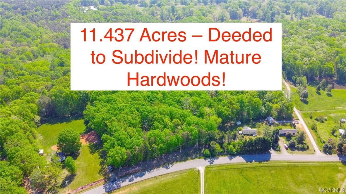 0 Turner Road Goochland, VA 23063 - Photo 1 of 9 a sign that is sitting in front of flowers