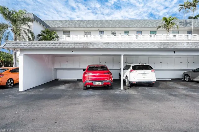 a view of a park with large trees