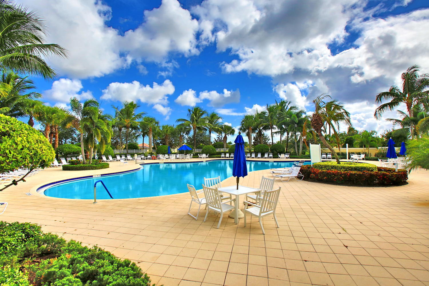 8224 Pine Cay Road Wellington, FL 33414 - Photo 29 of 44 Heated Resort Pool