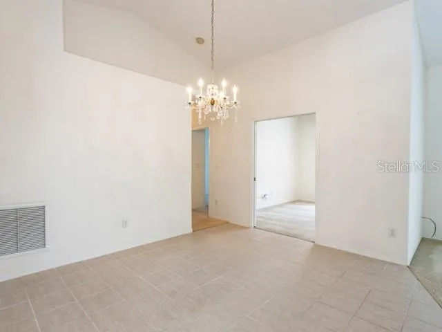 a view of a chandelier in big room