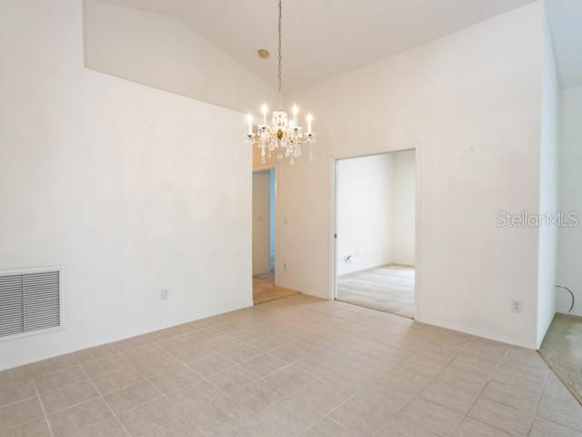 6 Summer Terrace, Unit 6 Palm Coast, FL 32137 - Photo 18 of 30 a view of a chandelier in big room and chandelier