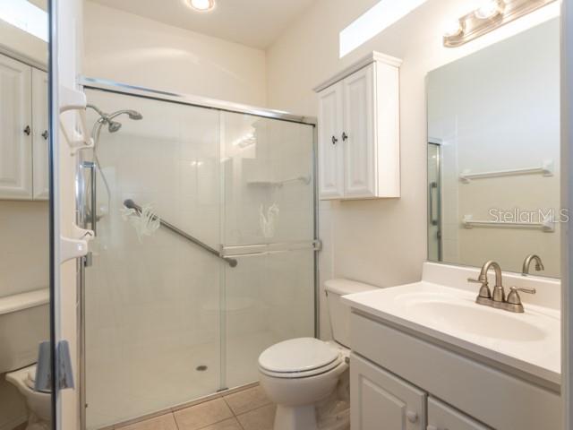 6 Summer Terrace, Unit 6 Palm Coast, FL 32137 - Photo 25 of 30 a bathroom with a sink toilet and shower