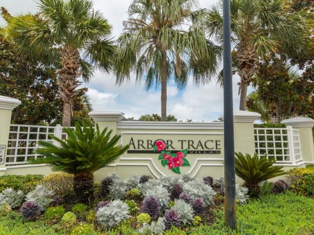 6 Summer Terrace, Unit 6 Palm Coast, FL 32137 - Photo 3 of 30 a sign that is sitting in front of a house