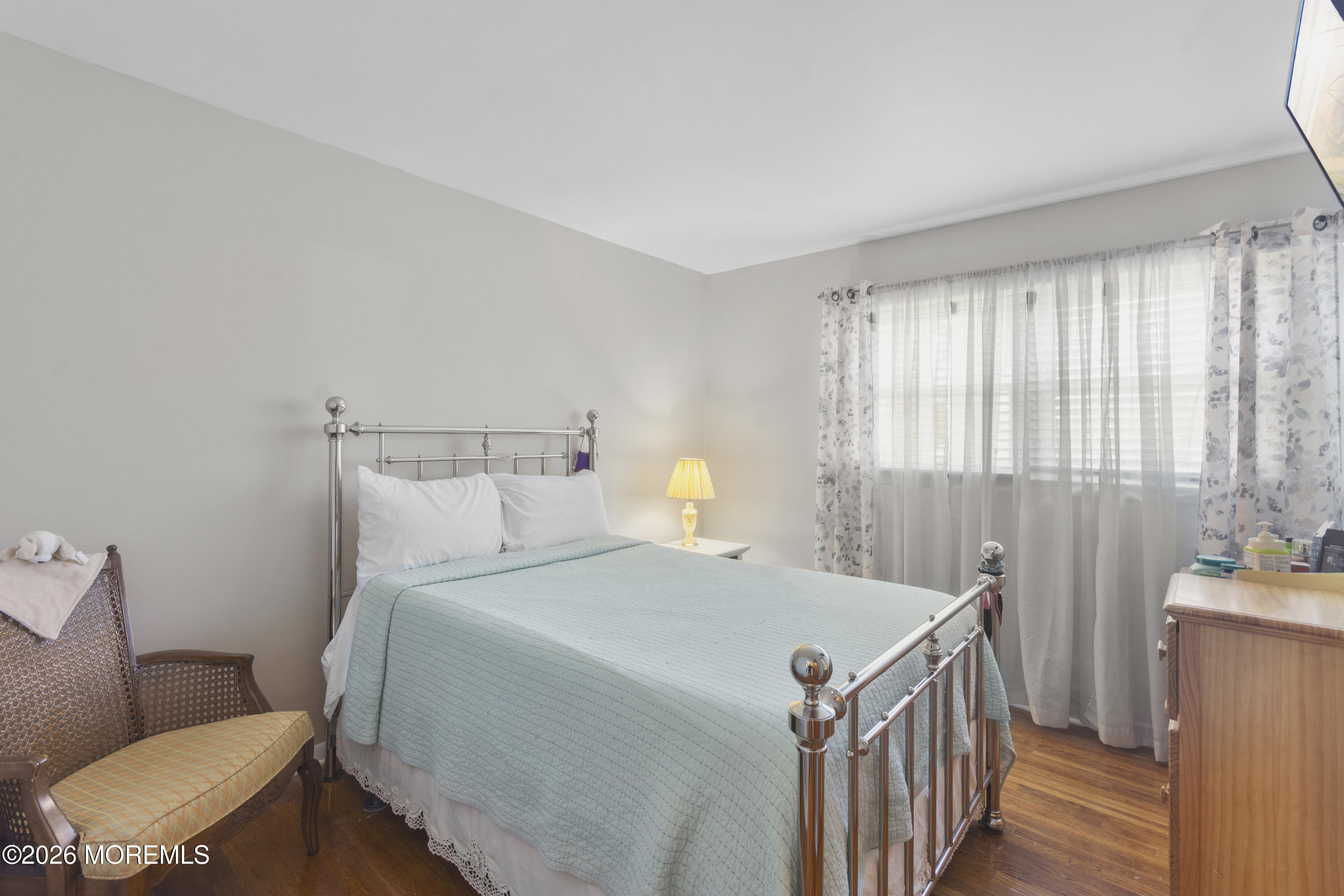 416 Midstreams Road Brick, NJ 08724 - Photo 17 of 27 a bedroom with a bed and a table in it