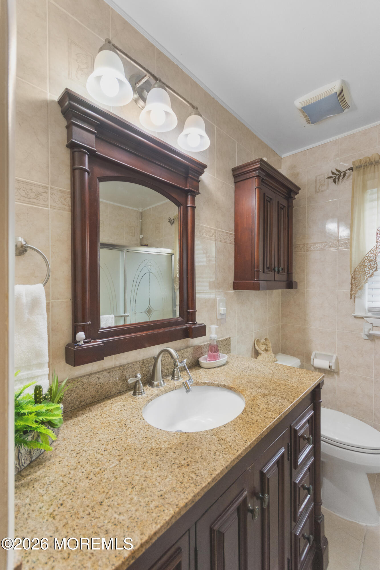 416 Midstreams Road Brick, NJ 08724 - Photo 20 of 27 a bathroom with a granite countertop sink and a mirror