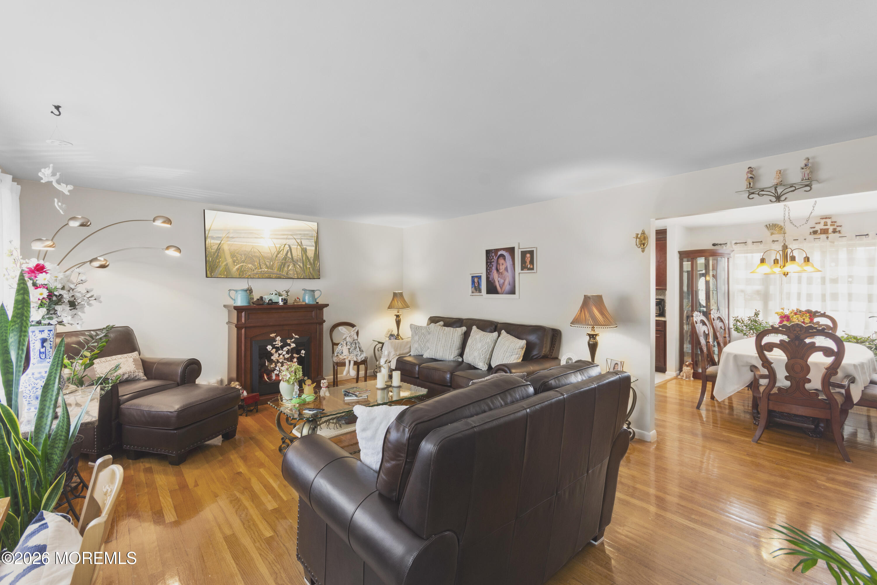 416 Midstreams Road Brick, NJ 08724 - Photo 3 of 27 a living room with furniture and a fireplace