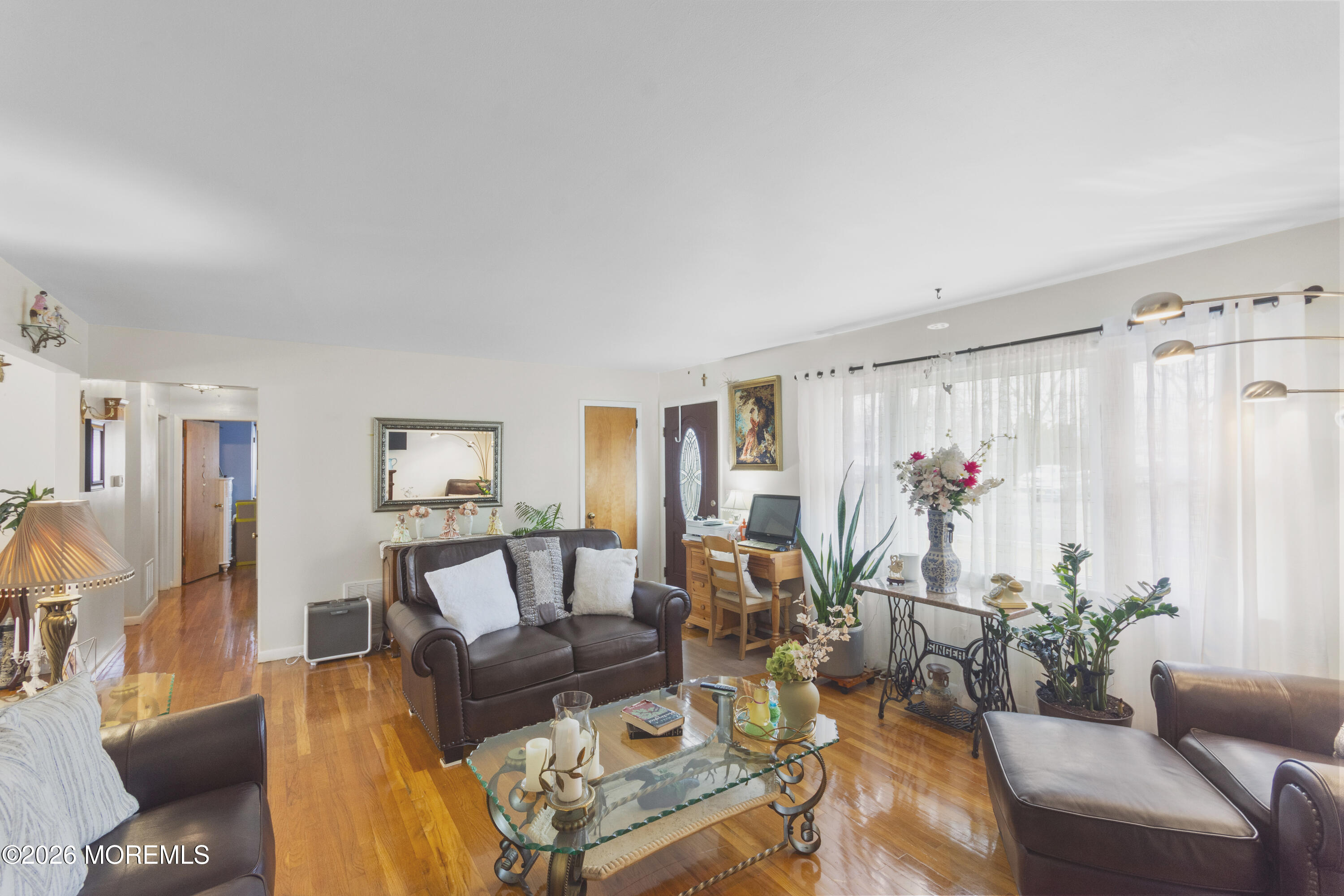 416 Midstreams Road Brick, NJ 08724 - Photo 5 of 27 a living room with furniture and a large window