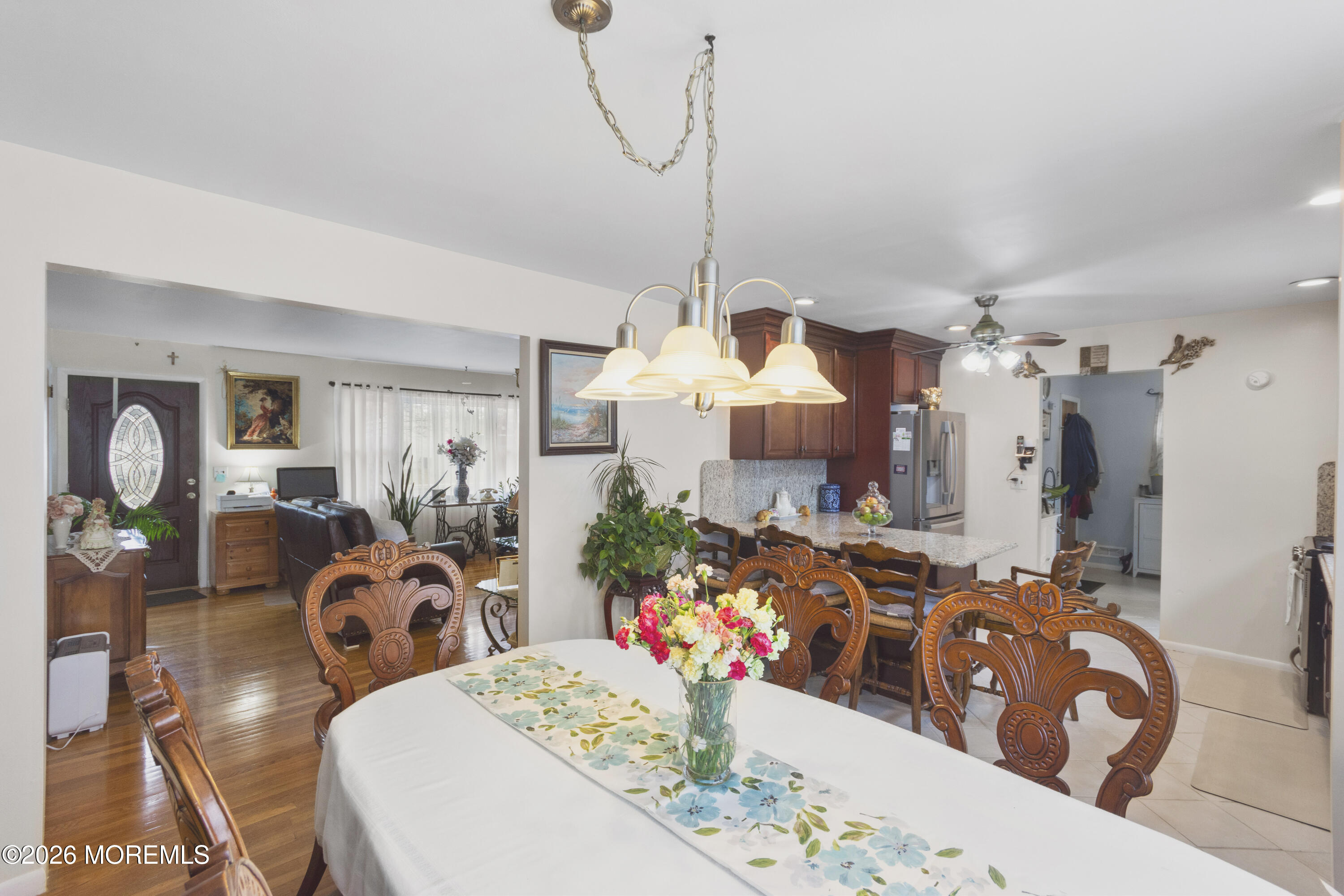 416 Midstreams Road Brick, NJ 08724 - Photo 6 of 27 a view of a dining room with furniture and wooden floor