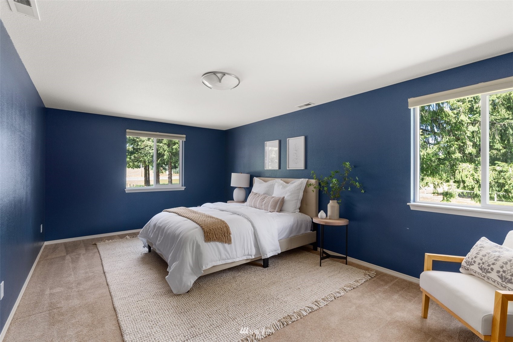 320 Tennessee Road Winlock, WA 98596 - Photo 14 of 40 a spacious bedroom with a bed and a window