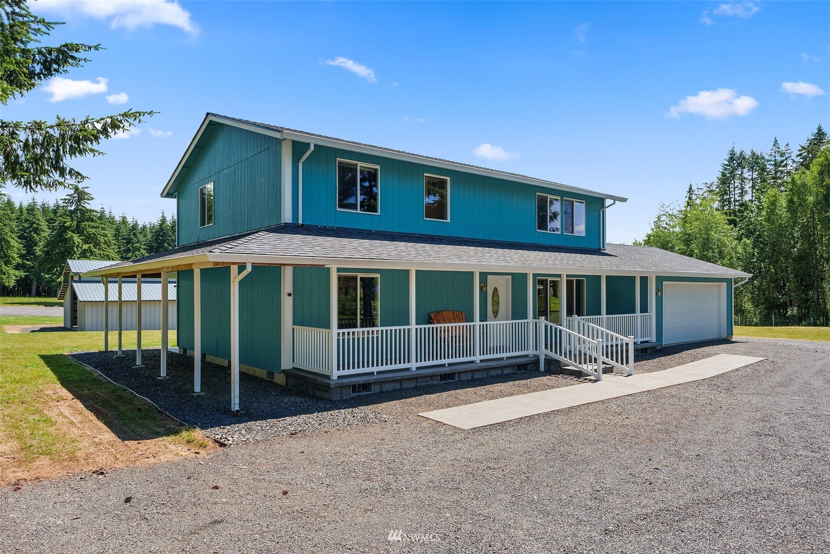 320 Tennessee Road Winlock, WA 98596 - Photo 2 of 40 a view of a house with backyard and porch