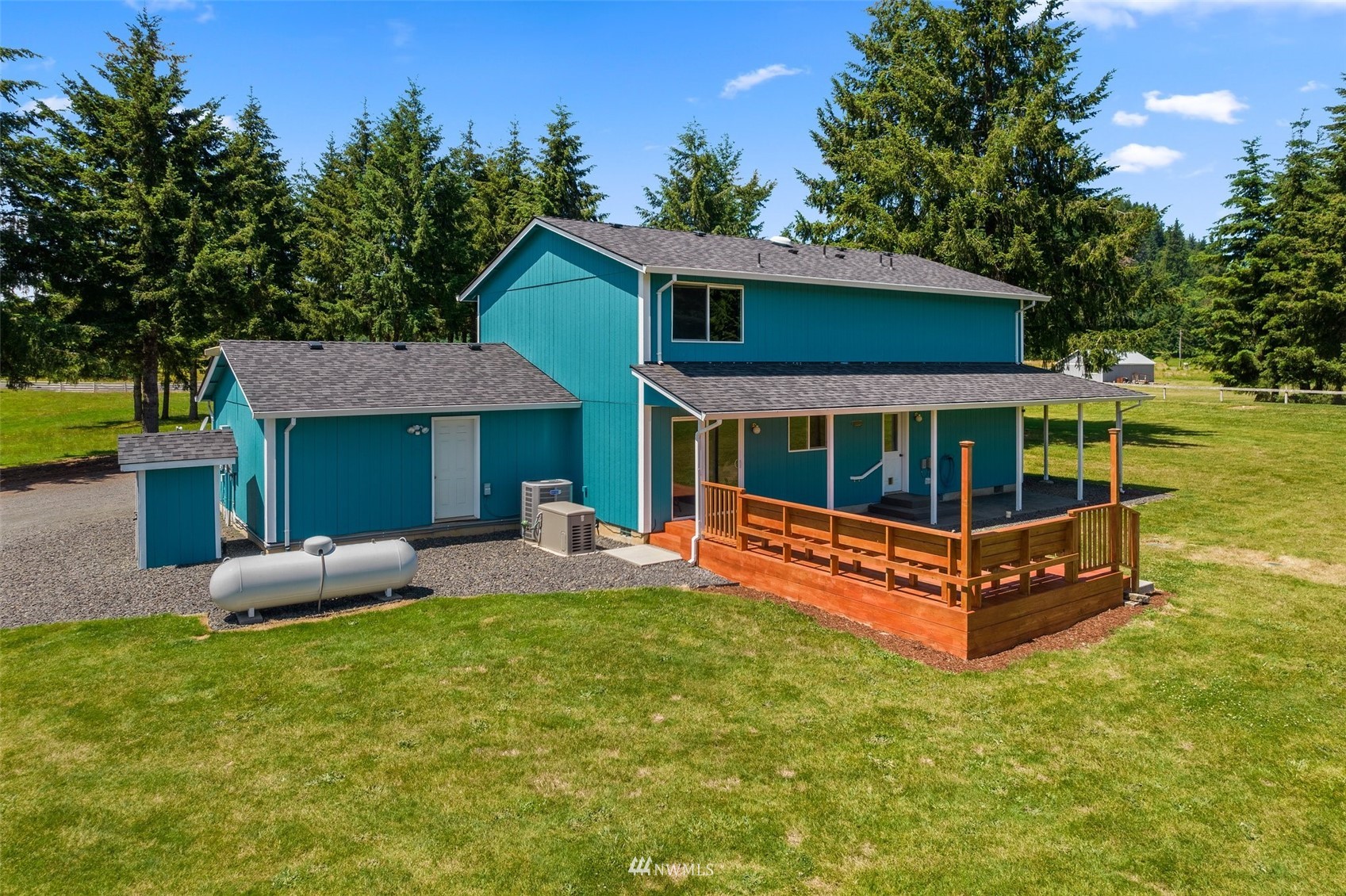 320 Tennessee Road Winlock, WA 98596 - Photo 29 of 40 a view of a house with a yard porch and furniture
