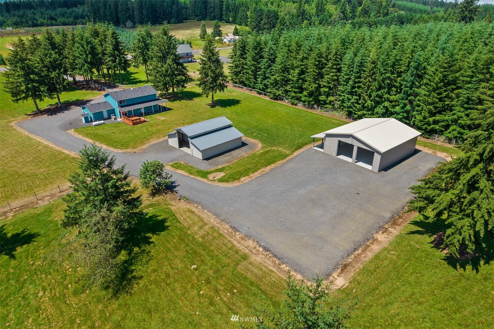 320 Tennessee Road Winlock, WA 98596 - Photo 4 of 40 an aerial view of a house with yard swimming pool and outdoor seating