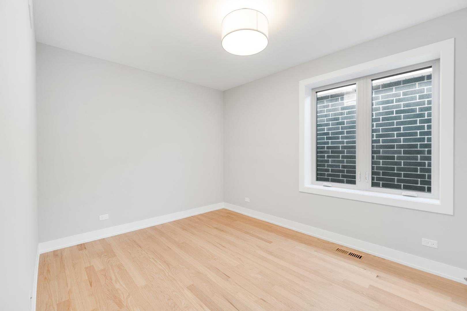 4167 South Halsted Street Chicago, IL 60609 - Photo 18 of 25 a view of an empty room with a window