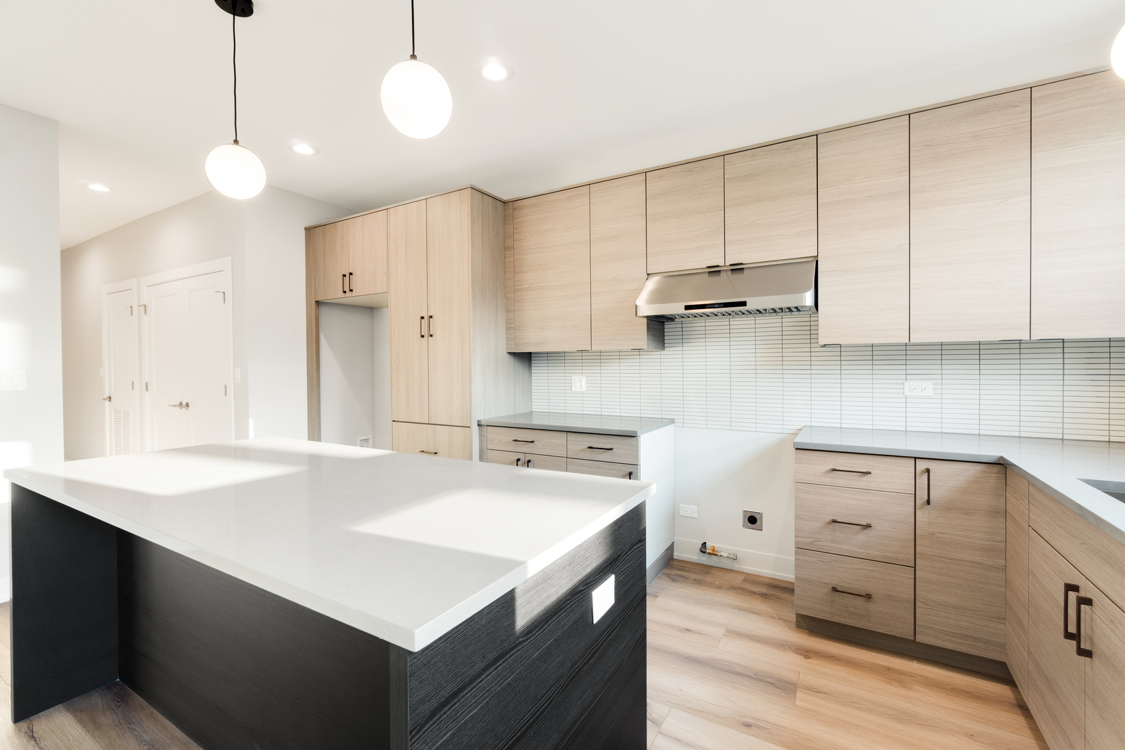 4167 South Halsted Street Chicago, IL 60609 - Photo 4 of 25 a kitchen with a sink a stove and cabinets