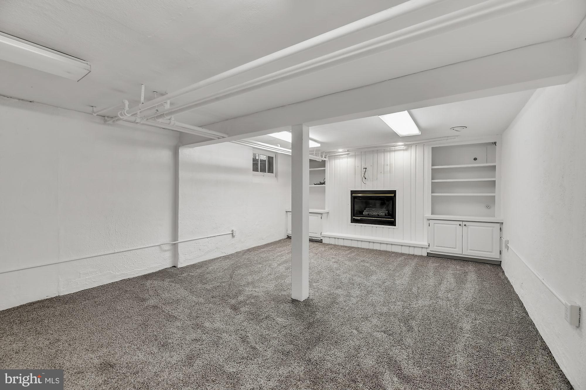 315 Paddington Road Baltimore, MD 21212 - Photo 22 of 33 New carpet through entire lower level