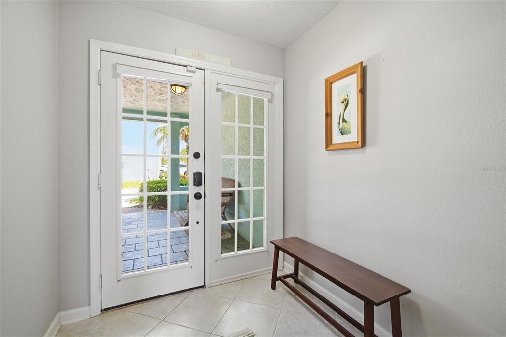 643 Garland Circle Indian Rocks Beach, FL 33785 - Photo 5 of 81 a room with furniture and a window
