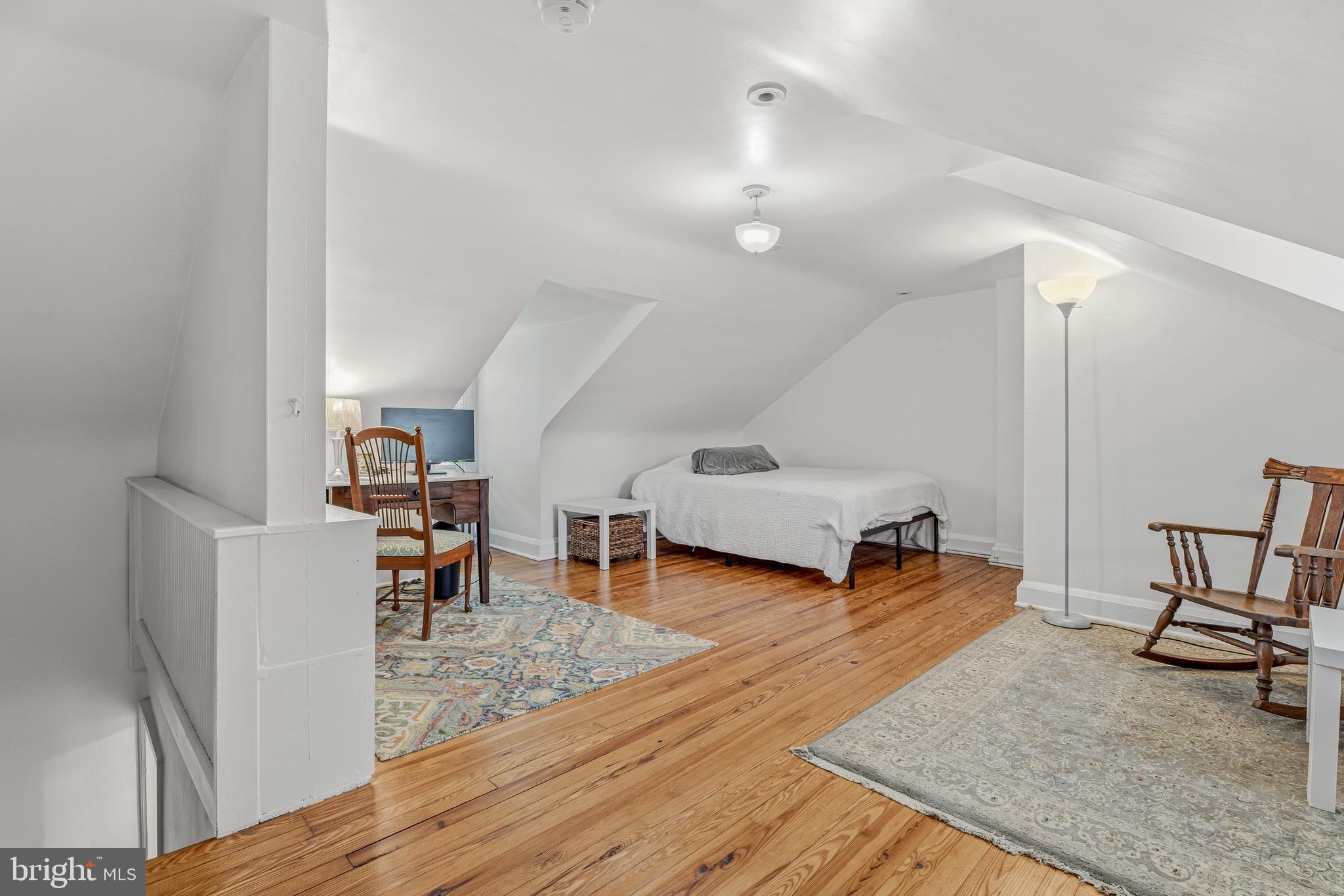 314 Murdock Road Baltimore, MD 21212 - Photo 24 of 42 a living room with furniture and a wooden floor