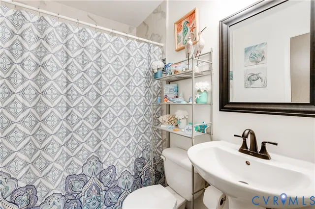 a bathroom with a sink and a toilet