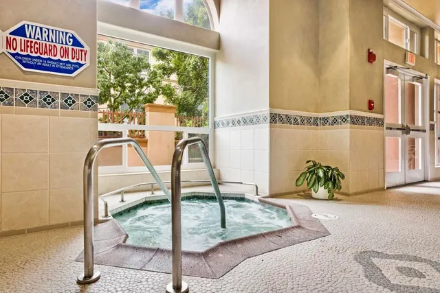 a view of a balcony with chairs