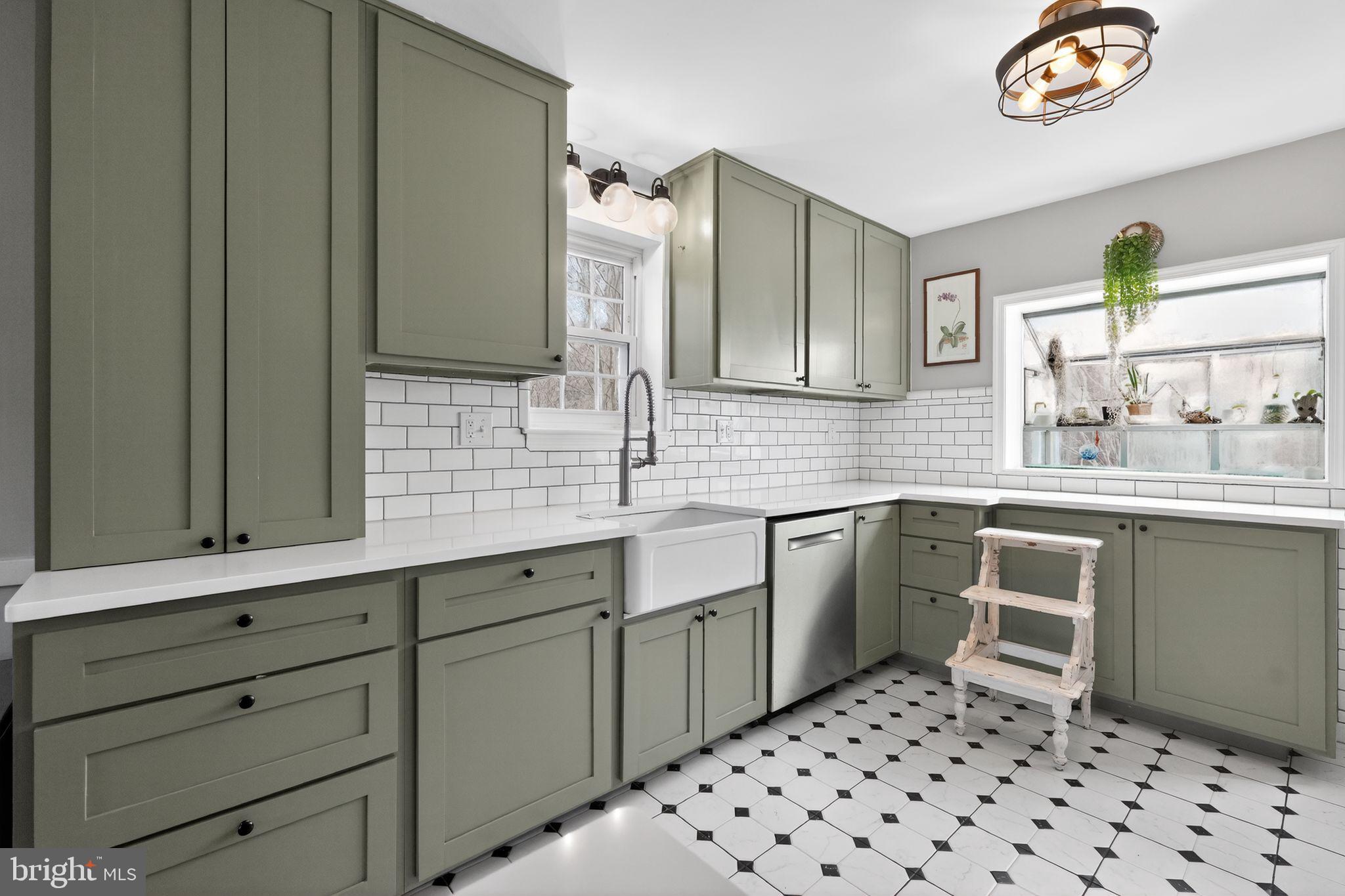2611 Arvin Street Silver Spring, MD 20902 - Photo 12 of 30 Chic green kitchen with classic tiles.