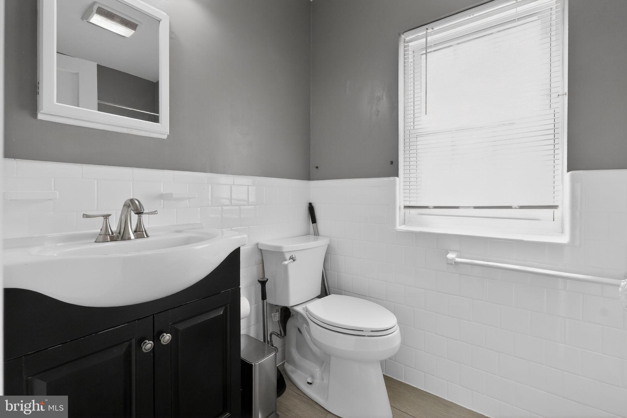2611 Arvin Street Silver Spring, MD 20902 - Photo 22 of 30 Modern bathroom with sleek finishes.