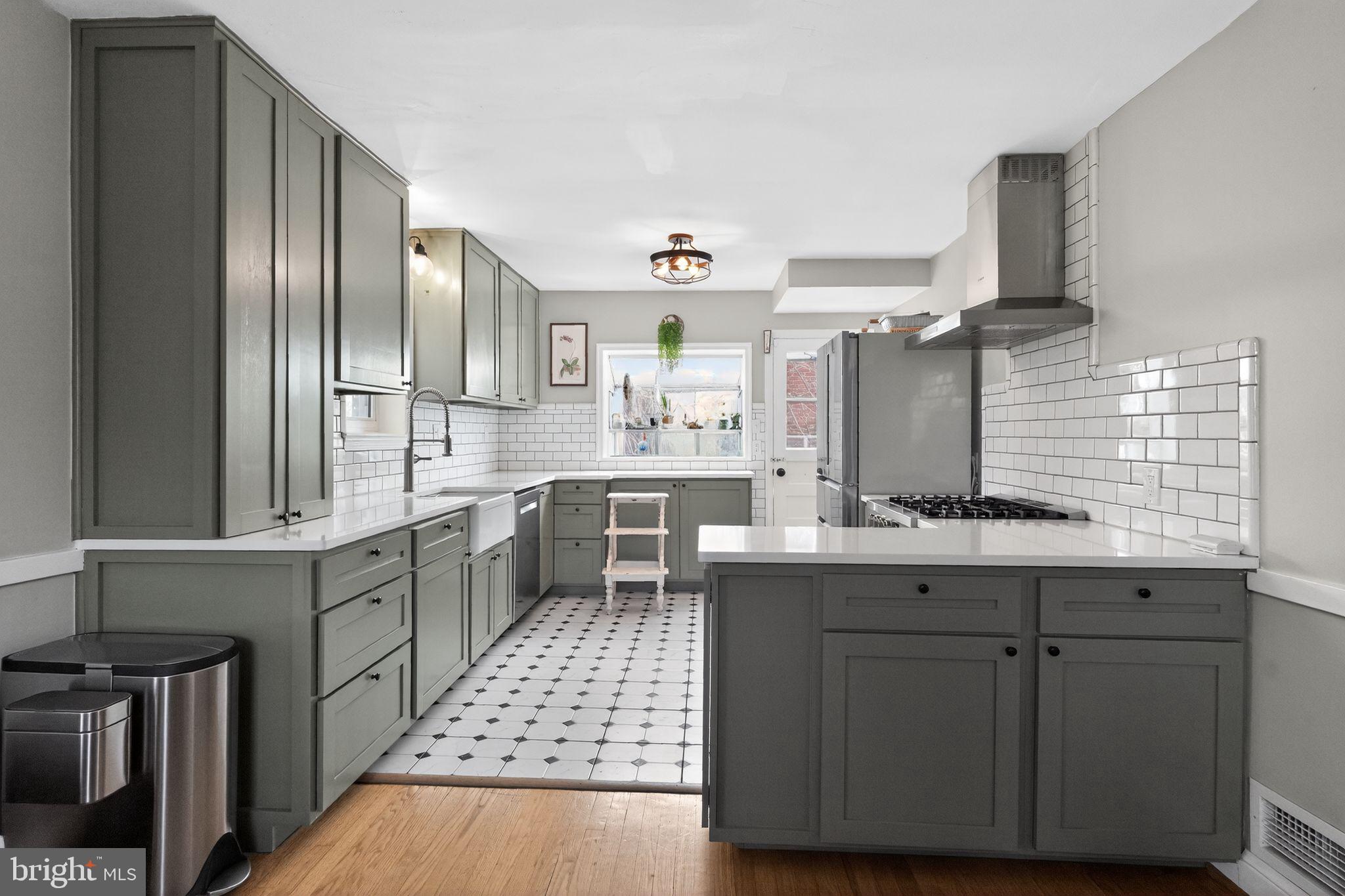 2611 Arvin Street Silver Spring, MD 20902 - Photo 9 of 30 Chic modern kitchen with stylish finishes.