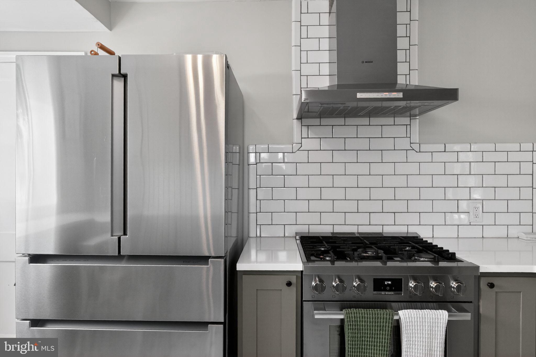 2611 Arvin Street Silver Spring, MD 20902 - Photo 10 of 30 Sleek kitchen with modern appliances.