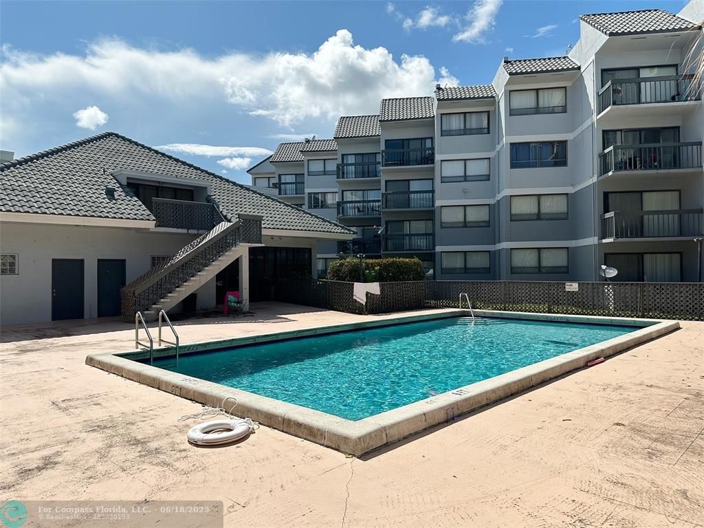 1920 North Congress Avenue, Unit 105 West Palm Beach, FL 33401 - Photo 19 of 19 a view of house with outdoor space
