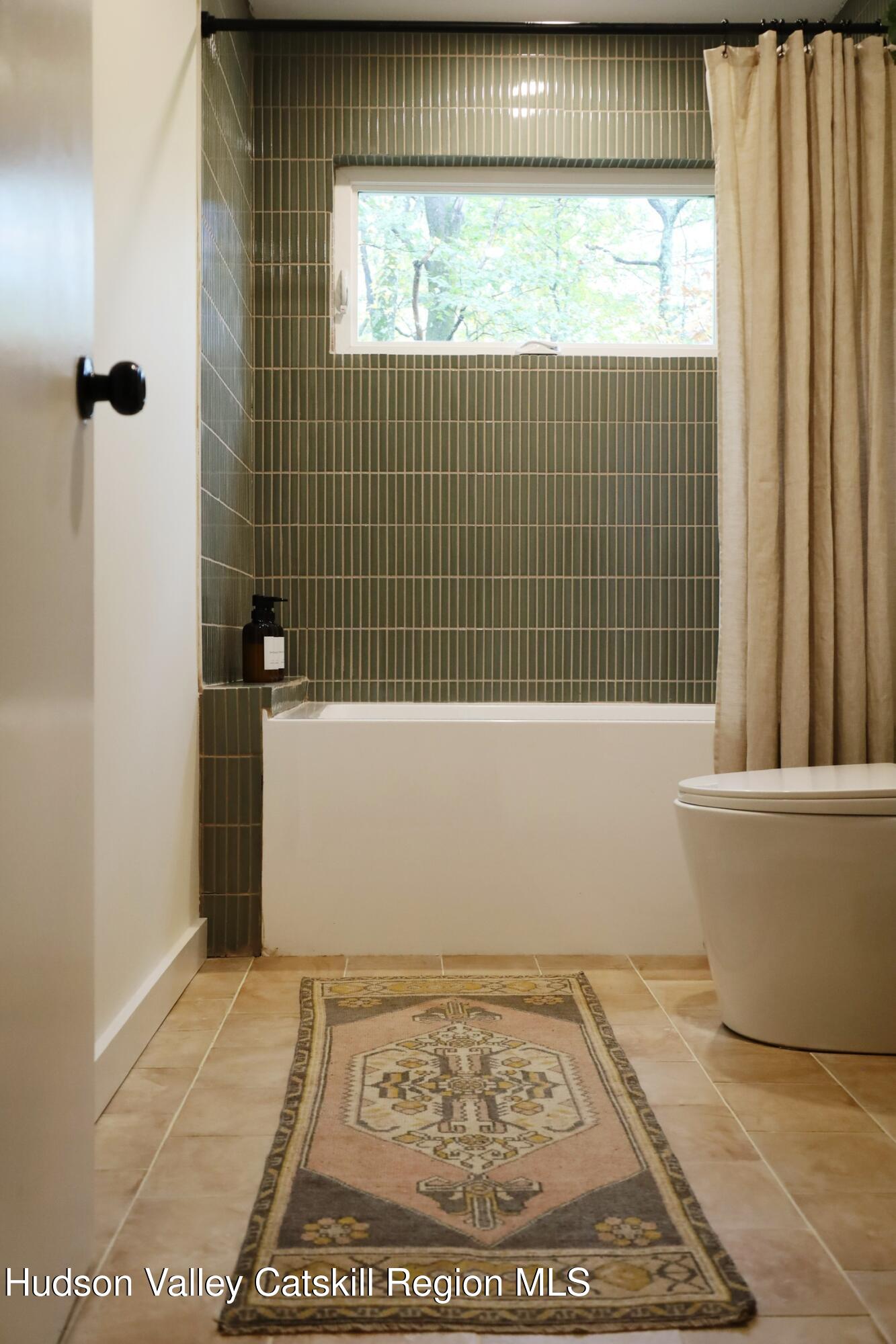 230 Potic Mountain Road Athens, NY 12414 - Photo 13 of 25 a bathroom with a window