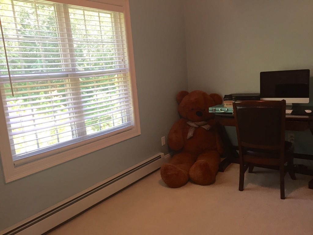3 Eastern Lane Rutland, MA 01543 - Photo 14 of 22 a room with a window and a chair