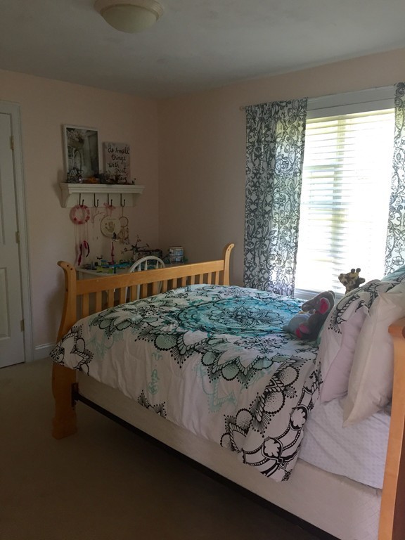 3 Eastern Lane Rutland, MA 01543 - Photo 16 of 22 a bedroom with a bed and window