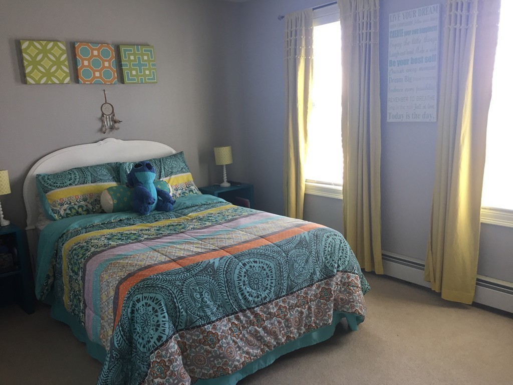 3 Eastern Lane Rutland, MA 01543 - Photo 17 of 22 a bedroom with a bed and window