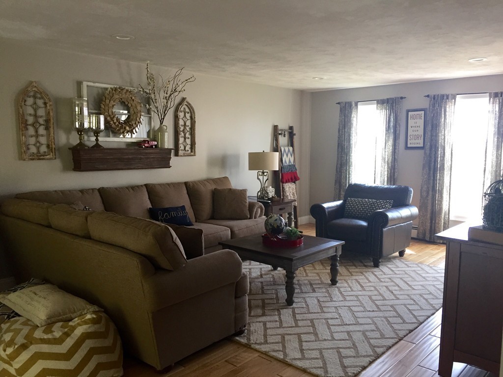 3 Eastern Lane Rutland, MA 01543 - Photo 7 of 22 a living room with furniture and a window