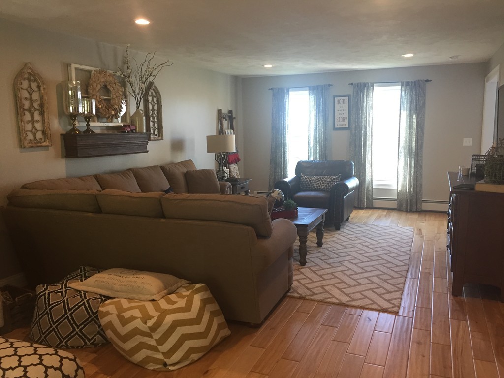 3 Eastern Lane Rutland, MA 01543 - Photo 9 of 22 a living room with furniture and a couch