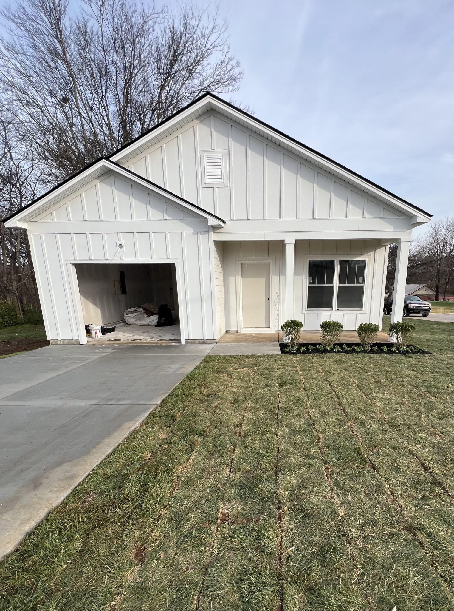 609 South Main Street Mount Pleasant, TN 38474 - Photo 2 of 8 a view of a house with backyard and chairs